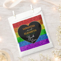 Le drapeau LGBT arc-en-ciel scintille le coeur mar
