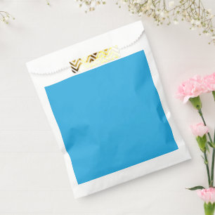 Sachets En Papier un arrière - plan bleu avec un
