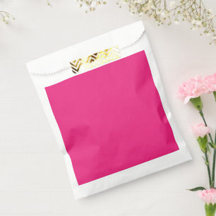 Sachets En Papier un arrière - plan rose avec un noir