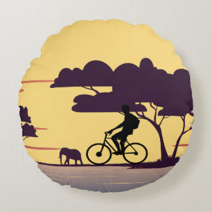Safari Bike Ride bei Sonnenuntergang - Radfahrer u Rundes Kissen