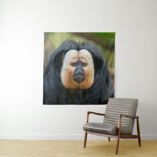 Saki Monkey mit intensivem Stare Wandteppich