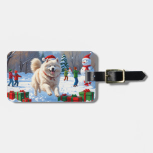 Samoyed Running in Snow mit Weihnachtshut Gepäckanhänger