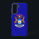 Samsung Galaxy S21 Case Flag von Michigan Hülle<br><div class="desc">Mit unserem exklusiven Handy-Cover mit der Staatsflagge verwandeln Sie Ihre Samsung Galaxy S21 in eine Feier des Stolzes von Michigan! Mit viel Liebe zum Detail gestaltet, präsentiert dieses Cover stolz die unverwechselbaren Elemente der Michigan-Fahne. Es verfügt über ein dunkelblaues Feld, in dessen Mitte das Staatswappen platziert ist. Das Wappen besteht...</div>