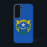 Samsung Galaxy S22 Fallflagge von Nevada Samsung Galaxy Hülle<br><div class="desc">Mit dem Samsung SGH-X500 und dem neuen Samsung SGH-X500 ist das Samsung SGH-E500 der ideale Begleiter für alle, die sich für einen unvergesslichen Aufenthalt interessieren. Dieses Cover wurde mit viel Liebe zum Detail entworfen und zeigt stolz die charakteristischen Elemente der Nevada-Fahne. Es verfügt über ein dunkelblaues Feld mit einem silbernen...</div>