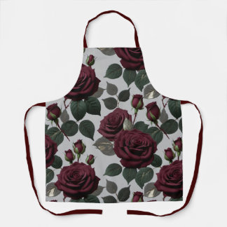 Samtige Dunkelburgunderrosen mit grünen Blättern Schürze