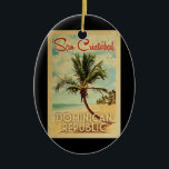 San Cristobal Palm Tree Vintage Travel Keramik Ornament<br><div class="desc">A uniquely retro mid-century modern San Cristobal Dominican Republic art print in vintage travel poster style. It features a curved palm tree on sandy beach with ocean under a blue cloudy sky.</div>