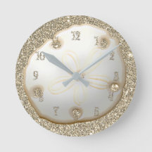 Sand dollar on sparkly gold beach sand