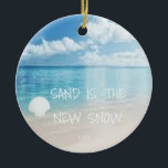 Sand Is The New Snow Beach Christmas Ornament<br><div class="desc">This fun beachliving design Sand is the new snow ornament feature a beach scene with a seashell. Personalize by adding a year.</div>