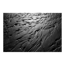 Sandmuster auf einem Strandposter