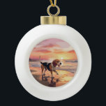 Sandy Paws Beagle Dog on Beach Sunset Keramik Kugel-Ornament<br><div class="desc">Tauchen Sie ein in die ruhige Schönheit unseres Hundes "Sandy Paws and Sunset Hues" mit Sonnenuntergang am Strand. Diese faszinierende Szene vereint das Wesen eines perfekten Abends am Ufer, mit einem treuen Hund, der den goldenen Sand und die atemberaubenden Farben der untergehenden Sonne genießt. Ob Hundeliebhaber oder Sonnenuntergang - dieses...</div>