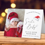 Santa Baby Christmas Foto Birth Ankündigung<br><div class="desc">Niedliche geschlechtsneutrale 4-Foto-Weihnachtsjahresankündigung mit gefaltetem Foto und "Introducing Our Sweet Little Santa Baby" in schlichter moderner Typografie und einem eleganten Drehbuch mit Herzschlag. Fügen Sie ihren Namen,  Geburtstag und Geburtsdaten hinzu. Im Inneren 3 zusätzliche Fotos,  ein Feriendomizil für Familien und Freunde sowie die Vornamen der Eltern und Geschwister.</div>