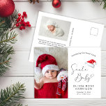 Santa Baby Christmas Foto Birth Ankündigungspostkarte<br><div class="desc">Niedliche, geschlechtsneutrale Weihnachtsankündigung mit dem Foto Ihres Neugeborenen und "Introducing Our Sweet Little Santa Baby" in einfacher moderner Typografie und einem eleganten Drehbuch mit Herzschlag, einer Aquarellbilderin einer Weihnachtsmannmütze, ihrem Namen, ihrem Geburtstag und ihren Geburtsdaten. Auf der Rückseite fügen Sie ein zusätzliches Foto, Ihren personalisierten Urlaub Gruß an Familie und...</div>