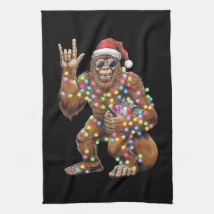 Santa Bigfoot Weihnachtsbeleuchtung Rock Lustig  Geschirrtuch
