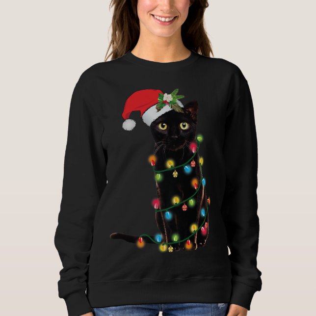 Santa Black Cat hallte in Weihnachtsbaumlicht auf Sweatshirt (Vorderseite)