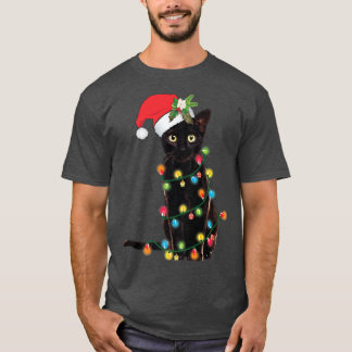Santa Black Cat hallte in Weihnachtsbaumlicht auf T-Shirt