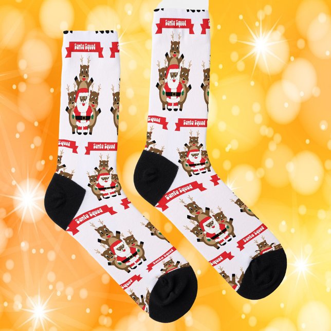 Santa Black Squad Reindeer Funny Pattern Socken (A pair of socks with a santa squad featuring a black santa and his reindeer.)
