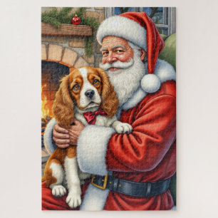 Santa Claus hält einen Cavalier King Charles Spani