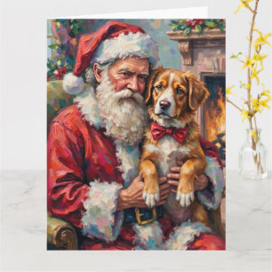 Santa Claus hält einen Greater Swiss Mountain Dog Karte