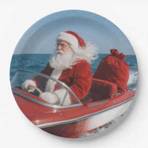 Santa Claus liefert Geschenke per Schnellboot Pappteller