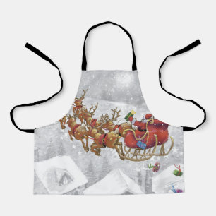 Santa Claus riding on sleigh with gift box Schürze