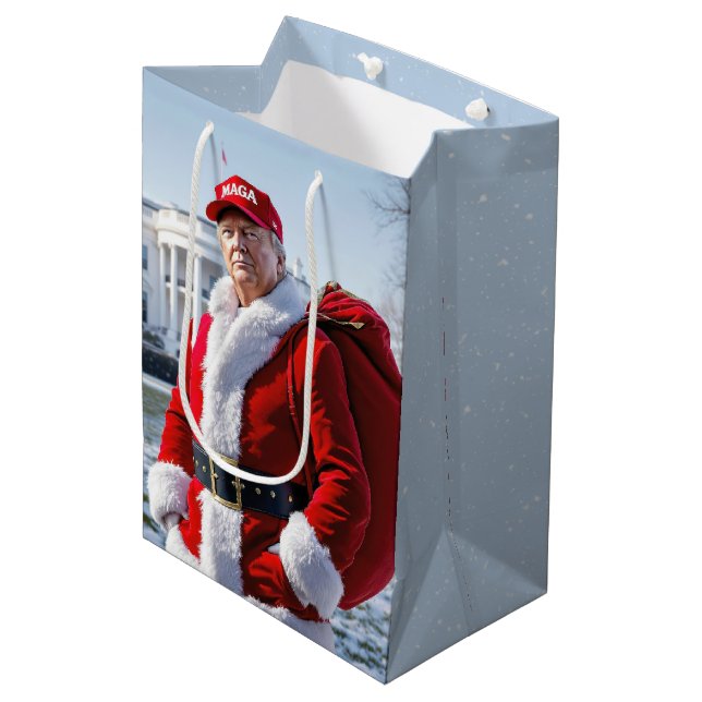 Santa Claus Trump mit einem roten Geschenksack Mittlere Geschenktüte (Vorderseite Schrägansicht)