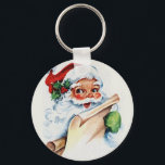 Santa Claus with his Christmas list scroll Schlüsselanhänger<br><div class="desc">Weihnachtsliste,  Weihnachtsgeschenke,  Weihnachtskrippen niedlich ,  Spaß Männer lustige Mann ,  Senioren lächelnd wünschen fröhlich,  Nachricht Vintager Fröhliche Zeitung ,  dieser Brief glücklicher Vater ,  rote Geschenkidee Cartoon Illustration,  Winterurlaub Weihnachten Weihnachtsclaus Liste, </div>