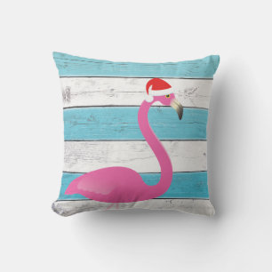 Santa Flamingo auf gestreiftem Kissen im Freien