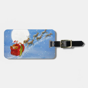 Santa mit seinem fliegenden Rentier Gepäckanhänger
