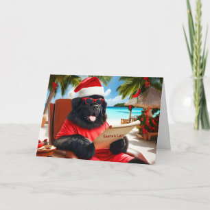 Santa on Beach überprüft seine Liste der Weihnacht Feiertagskarte