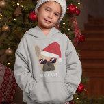 Santa Paws Christmas Light Fawn French Bulldog Hoodie<br><div class="desc">Santa Paws kommt nicht in die Stadt! Dieser helle französische Bulldogge ist bereit für die Weihnachtsfeiertage mit einer roten Weihnachtsmannmütze und natürlich nicht zu vergessen die stilvolle Sonnenbrille.</div>