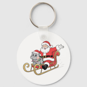 Santa Riding Sleigh mit Moo Deng Baby Hippo Schlüsselanhänger