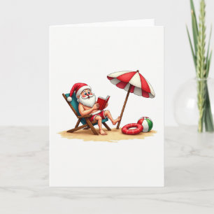 Santa Strandstuhl liest tropisches Weihnachten Karte