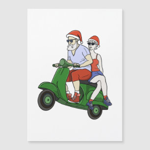 Santa und Frau Claus fahren mit einem Roller Magnetkarte
