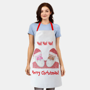 Santas noirs et blancs Joyeux tabliers de Noël