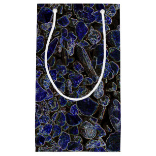 Saphir-blaue Steine mit leuchtendem Glühen Kleine Geschenktüte