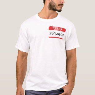 Sasquatch des Namensgroßer Spoof Fuß Abzeichen-T - T-Shirt