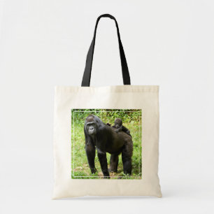 Säugling Lowland Gorilla auf dem Rücken der Mutter Tragetasche