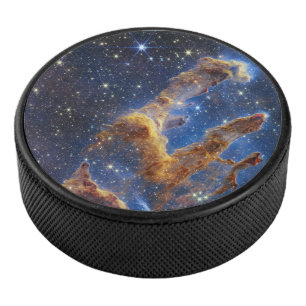 Säulen der Schöpfung sehen aus wie T-Rex Eishockey Puck