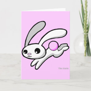 Sautent à cloche-pied le lapin avec la carte de