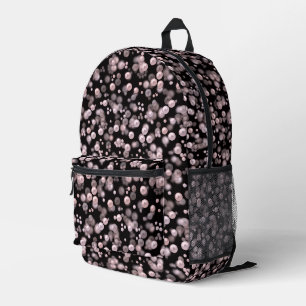 Scatterings von rosa und weißen Perlen auf schwarz Bedruckter Rucksack