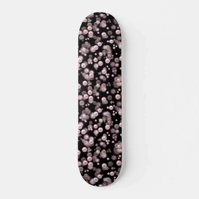 Scatterings von rosa und weißen Perlen auf schwarz Skateboard (Vorne)