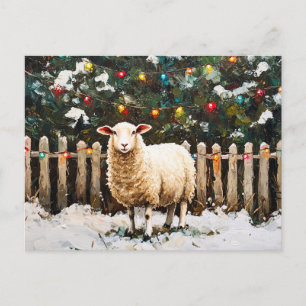 Schafe in einer weihnachtlichen Schneelandschaft Postkarte