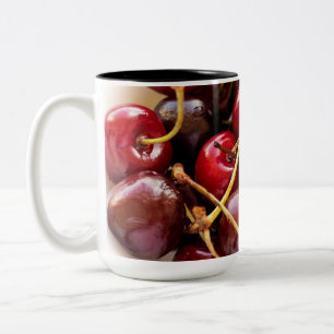 Schale mit Kirschen Zweifarbige Tasse