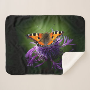 SCHALTFLÄCHE AUF LILA BLUME SHERPADECKE