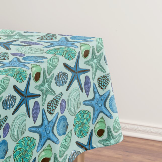 Schatten der blauen Seashells und des Tischdecke (Beispiel)