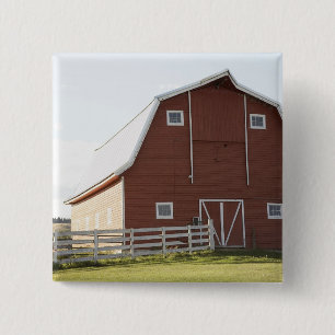 Scheune in der ländlichen Landschaft Button
