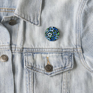 Schicke blaue Acryl-Blumen auf schwarzem runden An Button