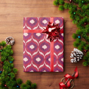 Schicke, farbenfrohe rote und violette Ikat-Stamme Geschenkpapier