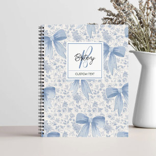 Schickes blaues Blumenmuster mit Schleifen Schrift Notizbuch