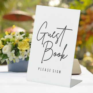 Schild für das Gästebuch bei der weißen Hochzeit